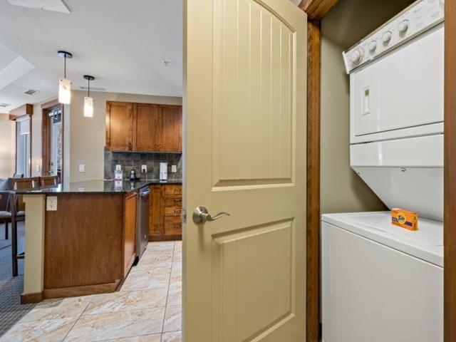 Sunny Tranquil Woods Turret In Falcon Crest Canmore